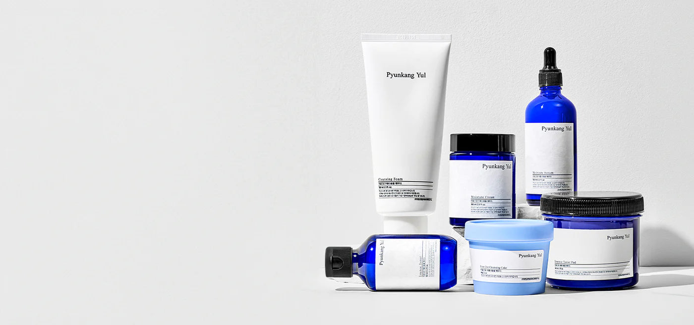Collection of Pyunkang Yul skincare products with visible branding on a light gray background